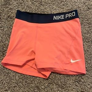 Small nike pro coral pink spandex with grey - blue band